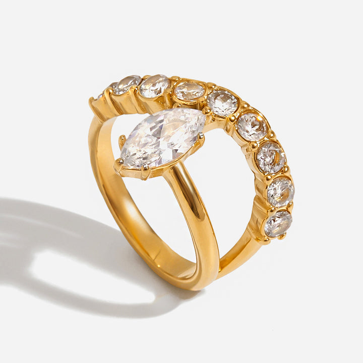 Gold Ring with Marquise - Shaped Central Stone and Curved Design