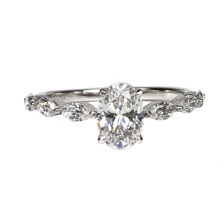 Oval Center Stone with Marquise Side Diamonds Ring