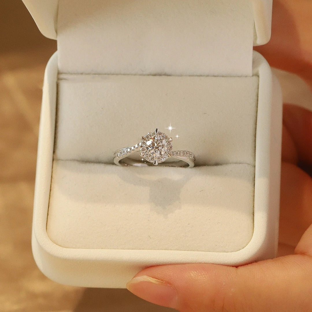 Twisted Band Solitaire Ring in Platinum Tone