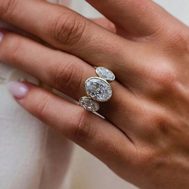 Gilded Circle Harmony 18K Gold Bezel-Set Three-Stone Ring