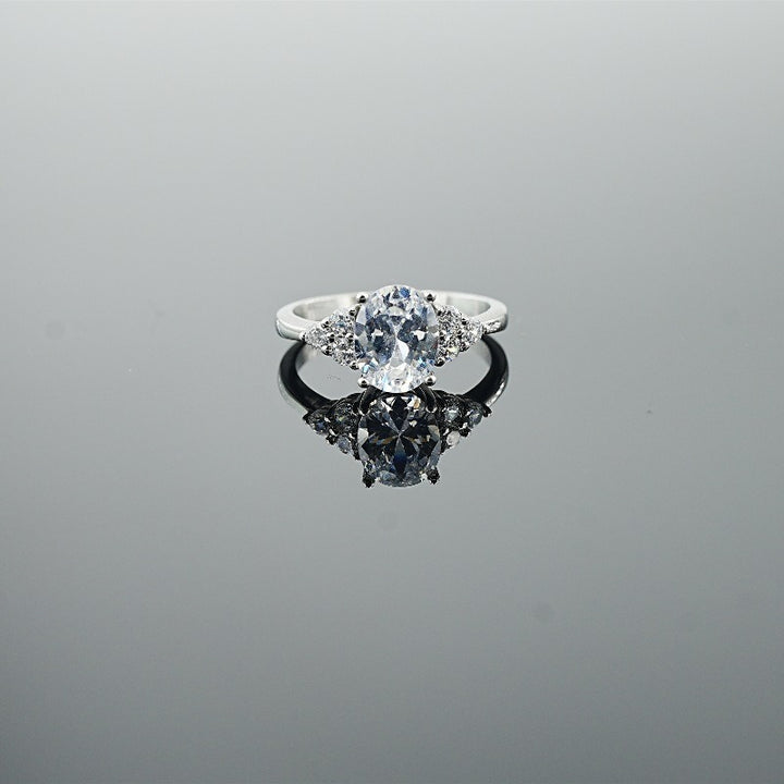 Classic Oval-Cut Colored Gemstone Ring | Elegant Three-Stone Design